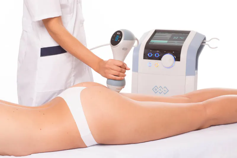 EMtone cellulite treatment at Square Mile Clinic, City of London, opposite Liverpool Street Practitioner using a genuine EMtone applicator on the glutes